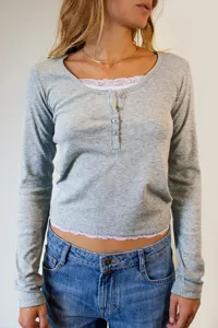 Grey fake two piece slim fit long sleeve t shirt with lace trim and buttons for women.