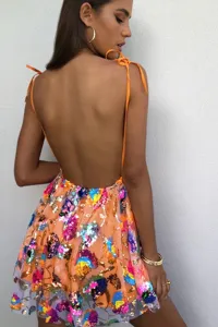 Backless sequin floral dress detail shot, highlighting colorful embroidery and delicate straps.