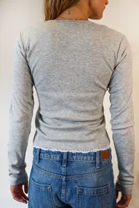 Women's slim fit long sleeve gray t-shirt with lace hem fake two-piece casual top for autumn.