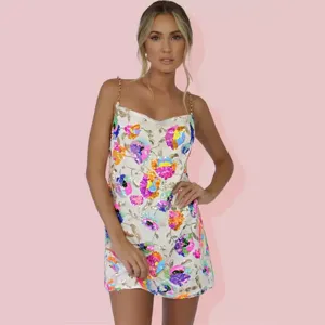 Sexy sequin floral slip mini dress with gold chain straps for women party club wear night out.