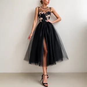 Elegant black tulle evening dress with floral sequin bodice and midi length mesh skirt.