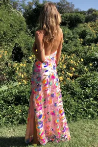 Stunning pink sequin floral backless split long dress detail with gold chain straps.