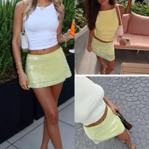 Detail view of the stylish American street style sequin mini skirt and ribbed tank top set.