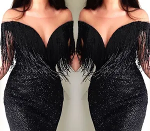 Black off-the-shoulder evening dress with sparkling glitter and stylish fringe tassel detailing.