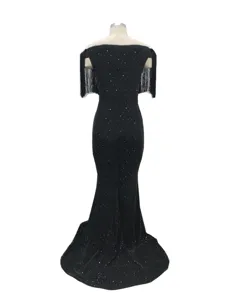 Detailed rear view of the black sparkling evening dress, highlighting shoulder fringe details.