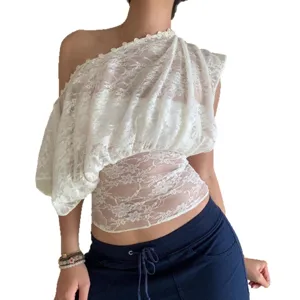 Exquisite one-shoulder lace top detail, featuring delicate hollow-out fabric and pearl buttons.