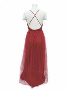 Back view detail of the elegant red sequin tulle evening dress featuring chic criss-cross straps.