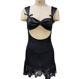 Black lace sexy mini dress detail showing the twisted bust design and delicate fabric.