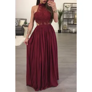 Detailed view of a stunning burgundy halter neck lace maxi dress with stylish side cutouts.