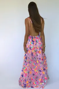 Detailed view of the backless sequin long dress, showing sparkling floral embroidery and straps.