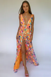 Deep V-neck sequin floral long dress detail featuring high split and open back design.