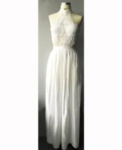 Exquisite white halter lace long dress detail view, elegant sleeveless evening gown design.
