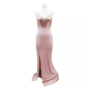 Sexy sequin slip evening dress with high slit backless design for party and club wear.