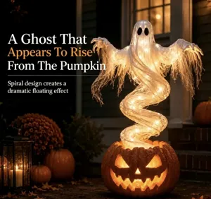 Detailed view of swirling ghost pumpkin yard lamp with dramatic light floating effect at night.