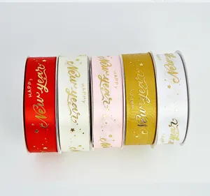 New Year gold stamping ribbon rolls set for gift wrapping, holiday and party decoration.