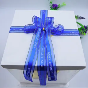 Blue satin edge English ribbon with Happy Birthday text, perfect for gift and cake packaging.
