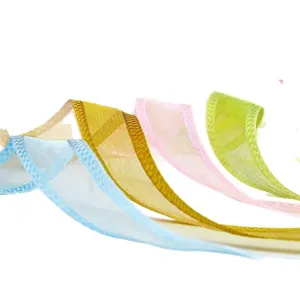 Rouleaux de ruban en organza coloré avec bord satiné pour emballage cadeau et déco de gâteaux.