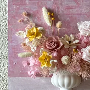 Close up of 3D French oil painting preserved flower bouquet wall vase detail view.