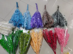 Colorful preserved dried orange leaves flower bouquets for home wedding DIY floral decor.