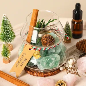 Caja de regalo difusor de piedra aromática navideña con cristales verdes y aceite esencial.