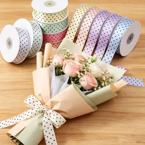 Polka dot ribbon for flower bouquet wrapping, gift packaging, and party decoration crafts.
