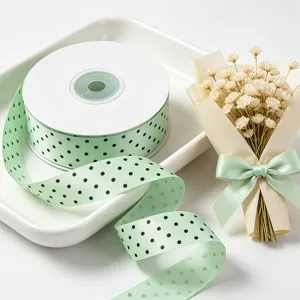 2.5cm polka dot ribbon for gift wrapping, bouquet packaging, and craft decoration.