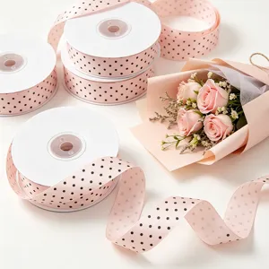 Pink polka dot ribbon 2.5cm wide, classic design for gift wrapping, bouquet and garment decoration.