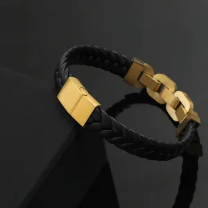 Men's black braided leather bracelet with golden stainless steel magnetic clasp detail.