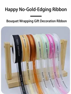 Colorful ribbon rolls for gift wrapping and flower bouquets, decorative fabric birthday ribbons.