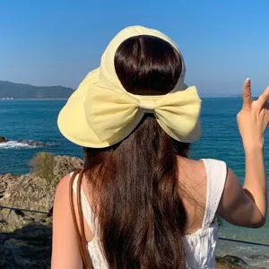 Breiter Sommer Sonnenhut mit Schleife, atmungsaktiver UV Schutz Strandvisor fuer Damen.
