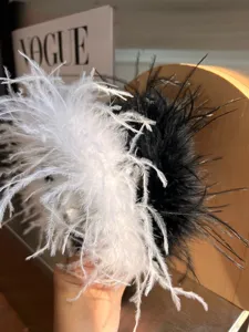 Ostrich feather headband black and white fairy style high cranial top hair accessory detail