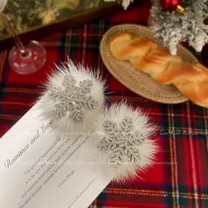 Elegant winter rhinestone snowflake hair clips with white fluffy plush for stylish everyday wear.