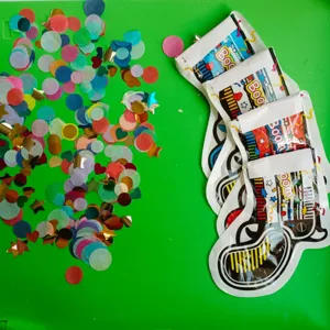 Selbstaufblasende Konfettipistole Party Popper mit bunten Papierschnipseln für Feiern.