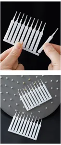 Detail view of mini shower head cleaning brush set, small gap cleaning tool for bathroom.