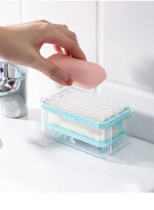 Detailed view of the multi-functional soap foaming box with drainage roller and clear case.