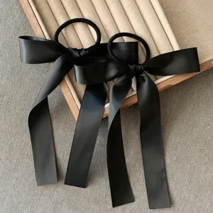 Chouchous de cheveux en ruban de satin noir, nœuds élégants pour coiffures douces, accessoires.