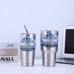 Detail shot of 30oz stainless steel insulated tumbler with straw and cold retention sleeve.