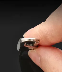 Detachable metal zipper pull detail, universal zipper replacement head for bags and clothing repair.