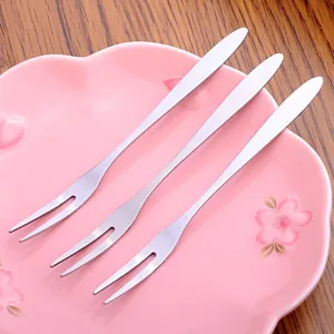 Stainless steel fruit fork set, elegant two-tine dessert cake forks for home kitchen use.