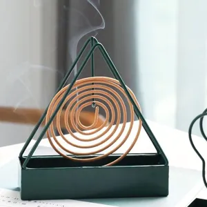 Minimalistische groene metalen driehoekige muggenspiraalhouder, creatieve wierookbrander.