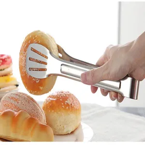 Stainless steel food tong, kitchen bread barbecue meat cooking utility tool detail.