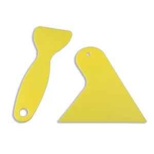 Set di raschietti in plastica gialla per pellicole telefoniche e auto, spatola resistente.