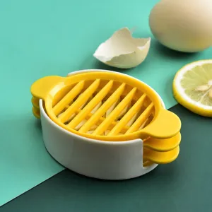 Multi-functional 3-in-1 egg slicer for kitchen home use, yellow and white plastic design.