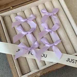 Mini purple satin bow hair clips set, sweet hair accessories for daily wear and styling.