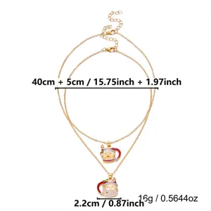 Dettaglio della collana con ciondolo a tazza Babbo Natale in oro con misure