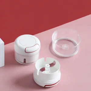 Manual garlic chopper mini food processor kitchen vegetable slicer with detachable bowl parts.