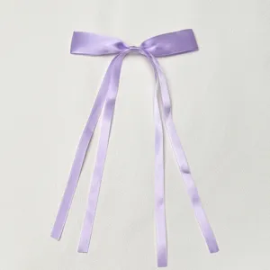 Light purple satin ribbon bow hair clip with elegant double streamers for sweet style.
