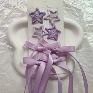 Vista dettagliata mollette per capelli stella viola con lunghi fiocchi set da 6