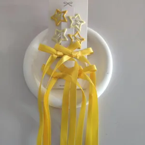 Set di 6 mollette per capelli a stella con lunghi fiocchi gialli, accessori carini per concerti.