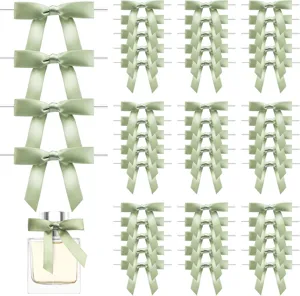 Detail of 1.5cm green ribbon bows with twist ties for gift packaging, candy bags and party decoration.